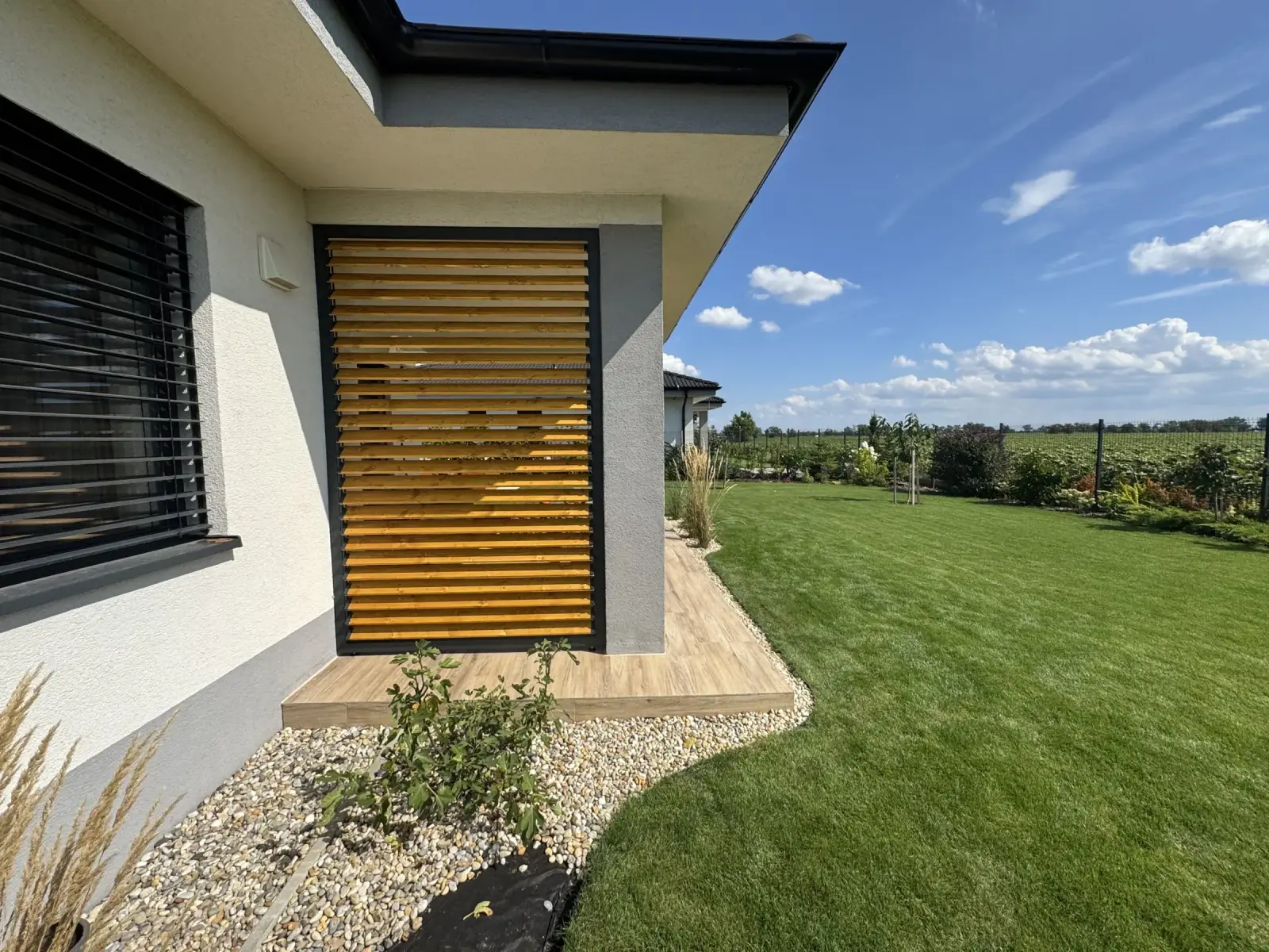 Aluminium frame and wooden louvres